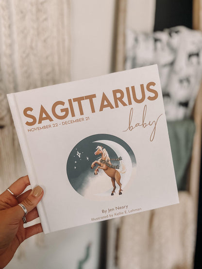 Personalized Sagittarius zodiac baby book for unique baby shower gifts and nursery shelves
