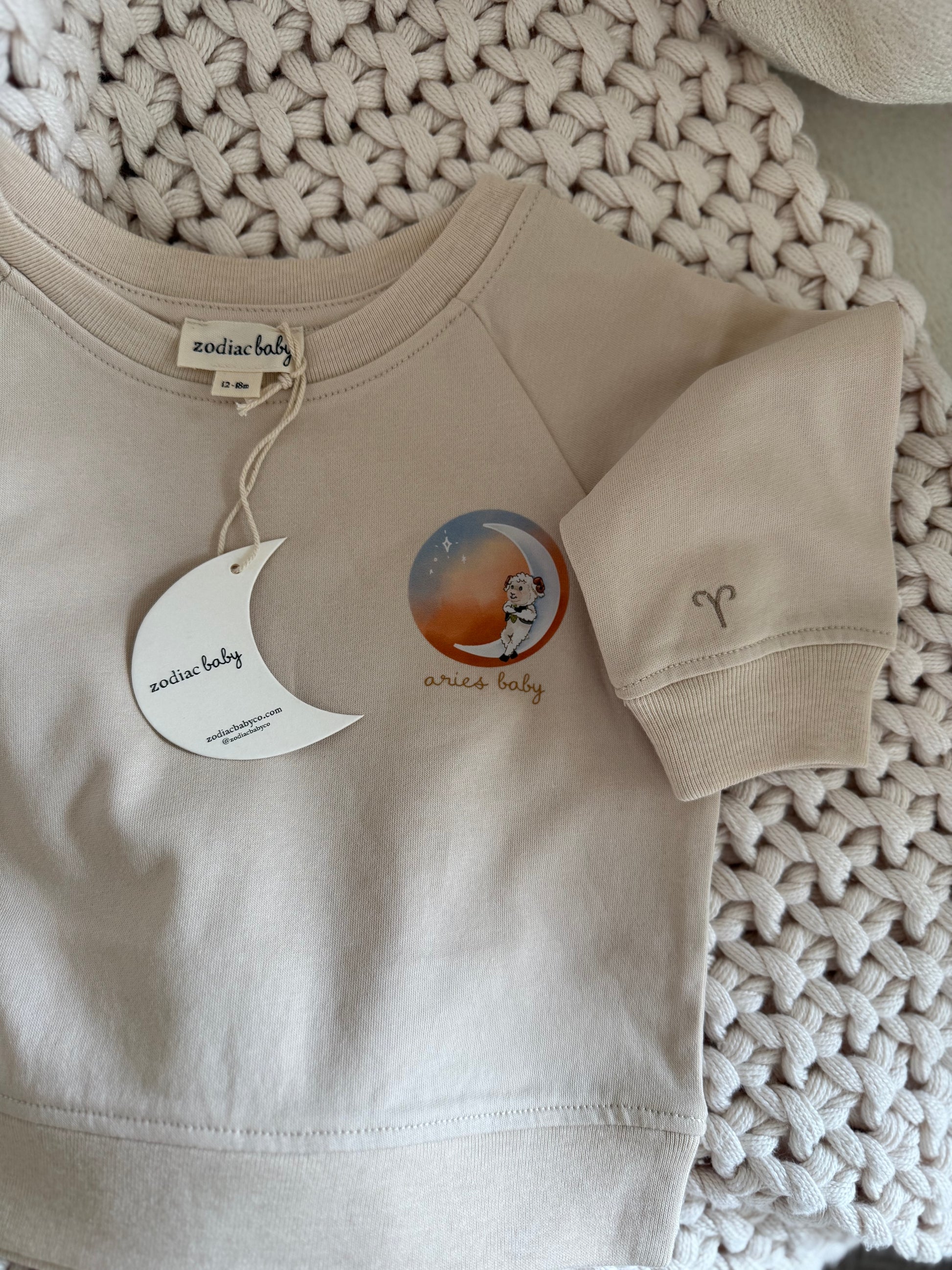 Beige Aries zodiac crewneck sweatshirt for toddlers and babies