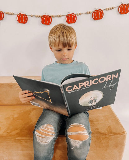 Personalized Capricorn zodiac baby book for unique toddler and kid birthday gifts