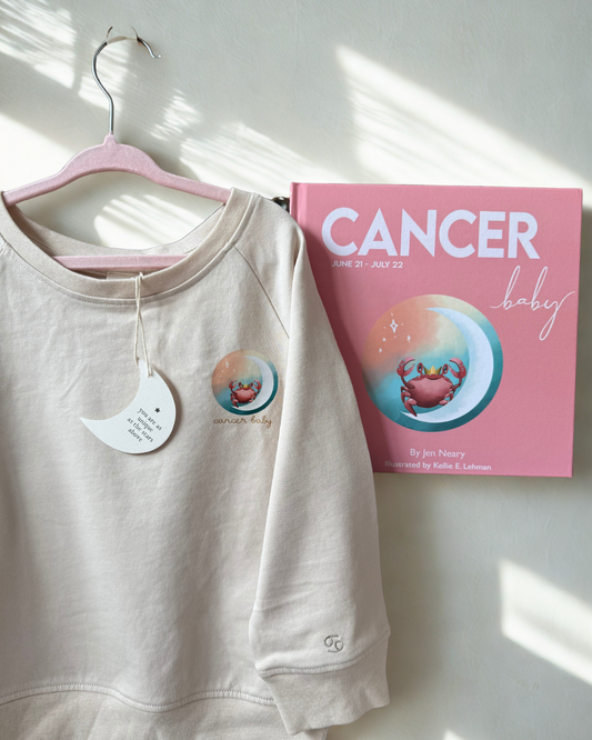 cancer zodiac book and matching toddler crewneck featuring a crab and moon for a unique and meaningful baby shower gift