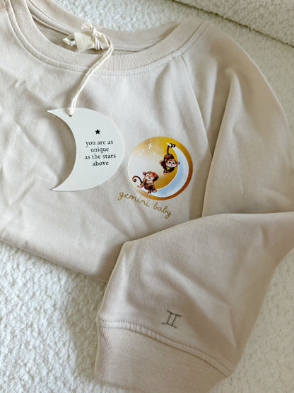 Beige Gemini zodiac crewneck sweatshirt for toddlers and babies