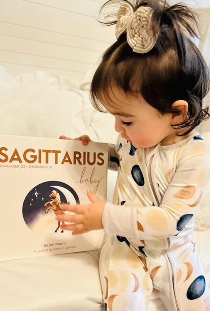 Personalized Sagittarius zodiac baby book for unique baby shower gifts and nursery shelves