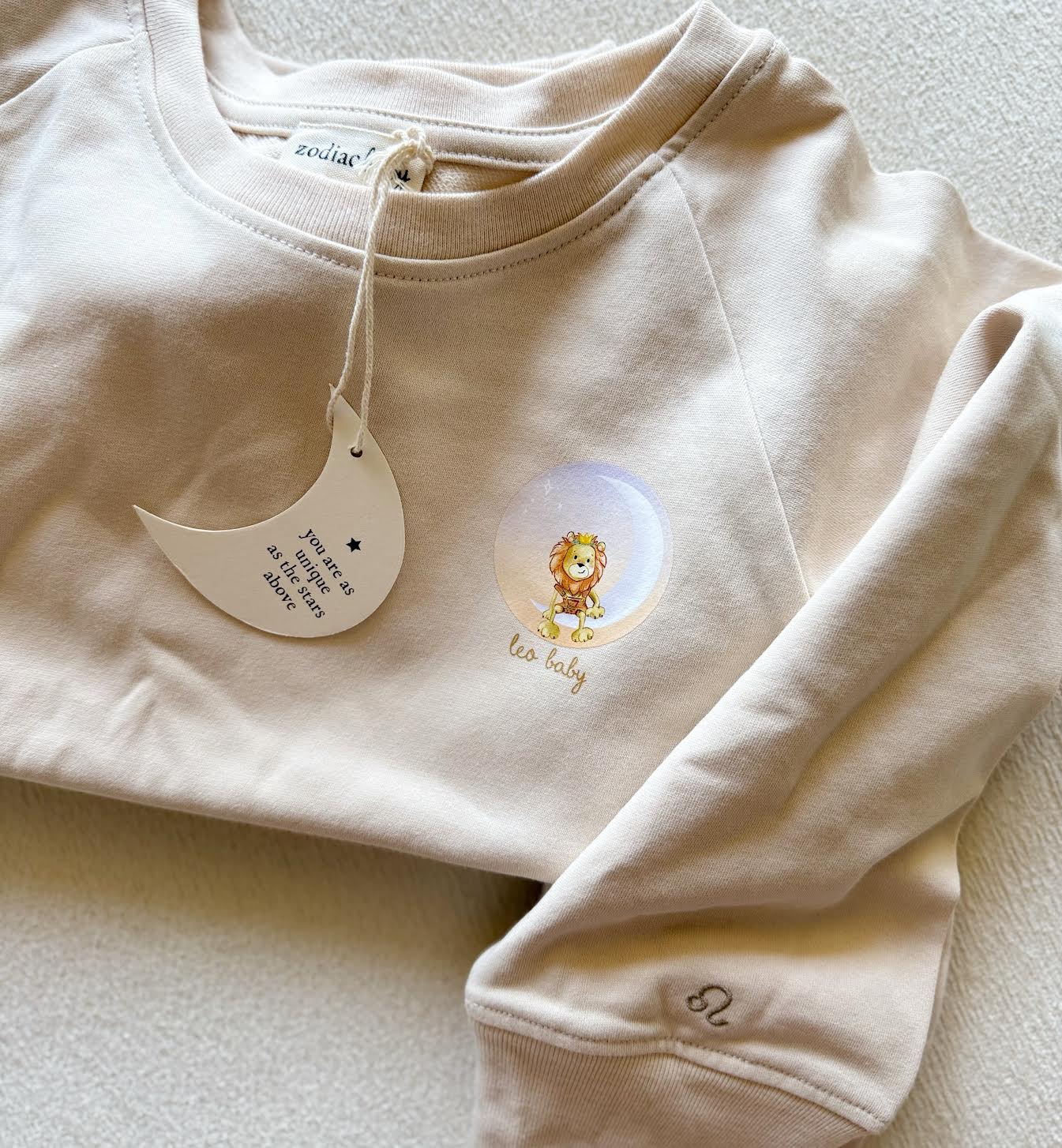 Beige Leo lion zodiac crewneck sweatshirt for toddlers and babies
