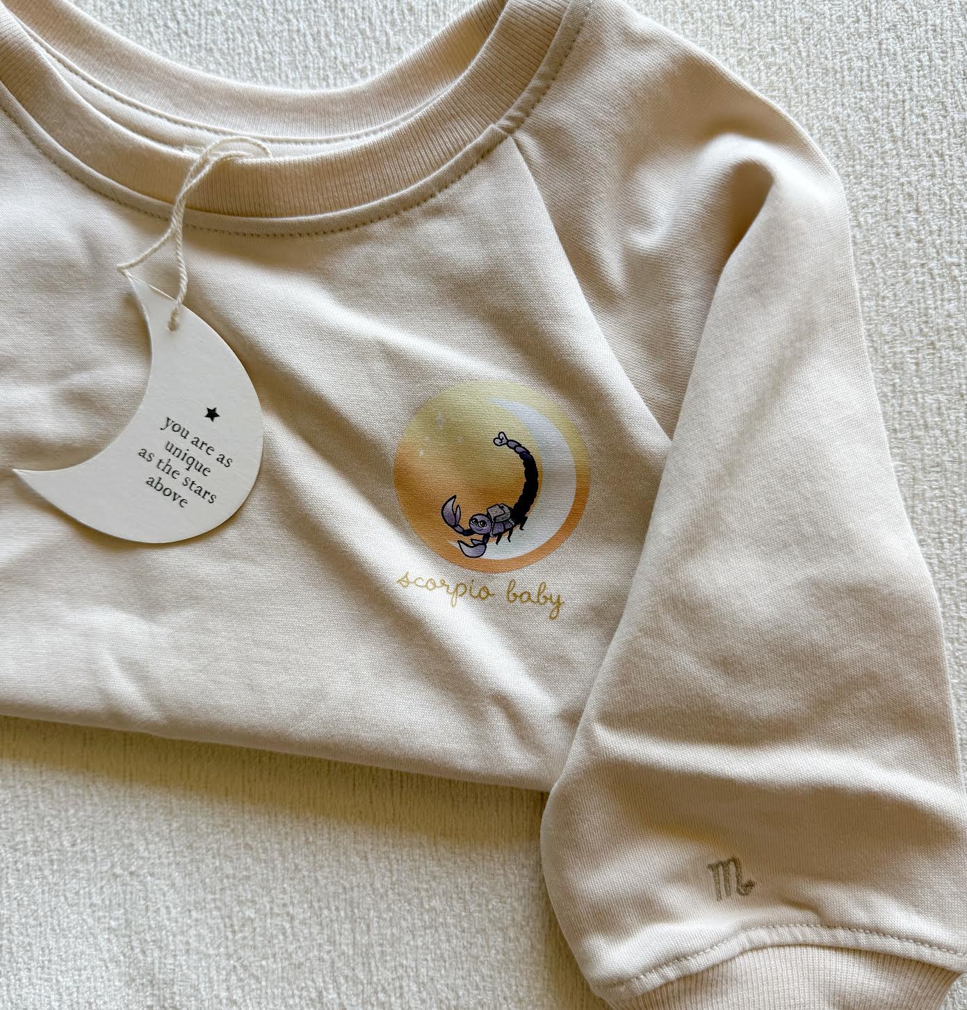 Beige Scorpio zodiac crewneck sweatshirt for toddlers and babies
