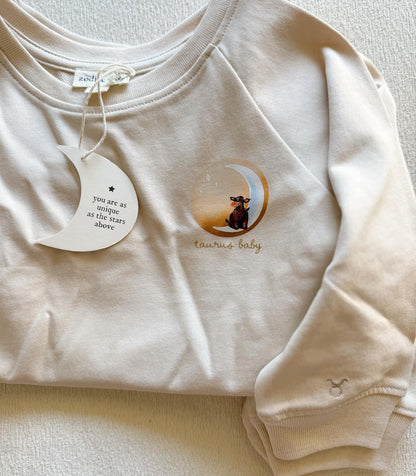Beige Taurus bull zodiac crewneck sweatshirt for toddlers and babies
